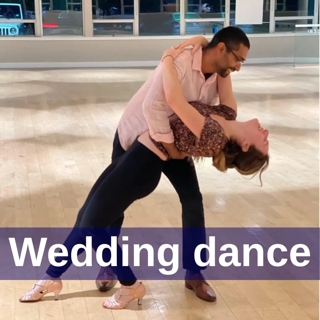 MI Fiesta Wedding Dance Lessons Boston Waltham Natick Engaged couple practicing a wedding dance dip during their private ballroom lesson at MI Fiesta Dance Studio.