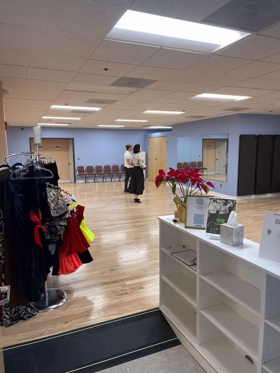 Ballroom Dance Studio Natick Ballroom dance lessons in Natick at MI Fiesta Dance Studio with students practicing on a hardwood dance floor